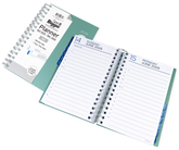 Open planner showing a daily layout with dates and days of the week, next to a closed planner.