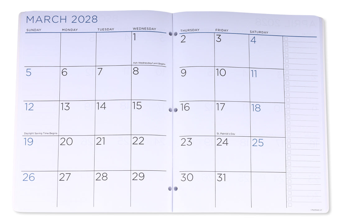 An open three-ring binder planner showing the monthly calendar spread for March 2028 on white pages with blue text and grid lines.
