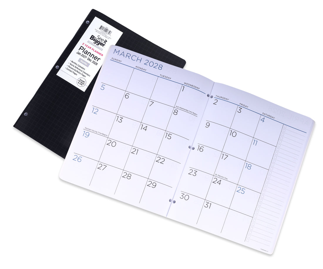 A black grid planner shown open to March 2028, with the brand label still attached to the cover, photographed on a clean white background.