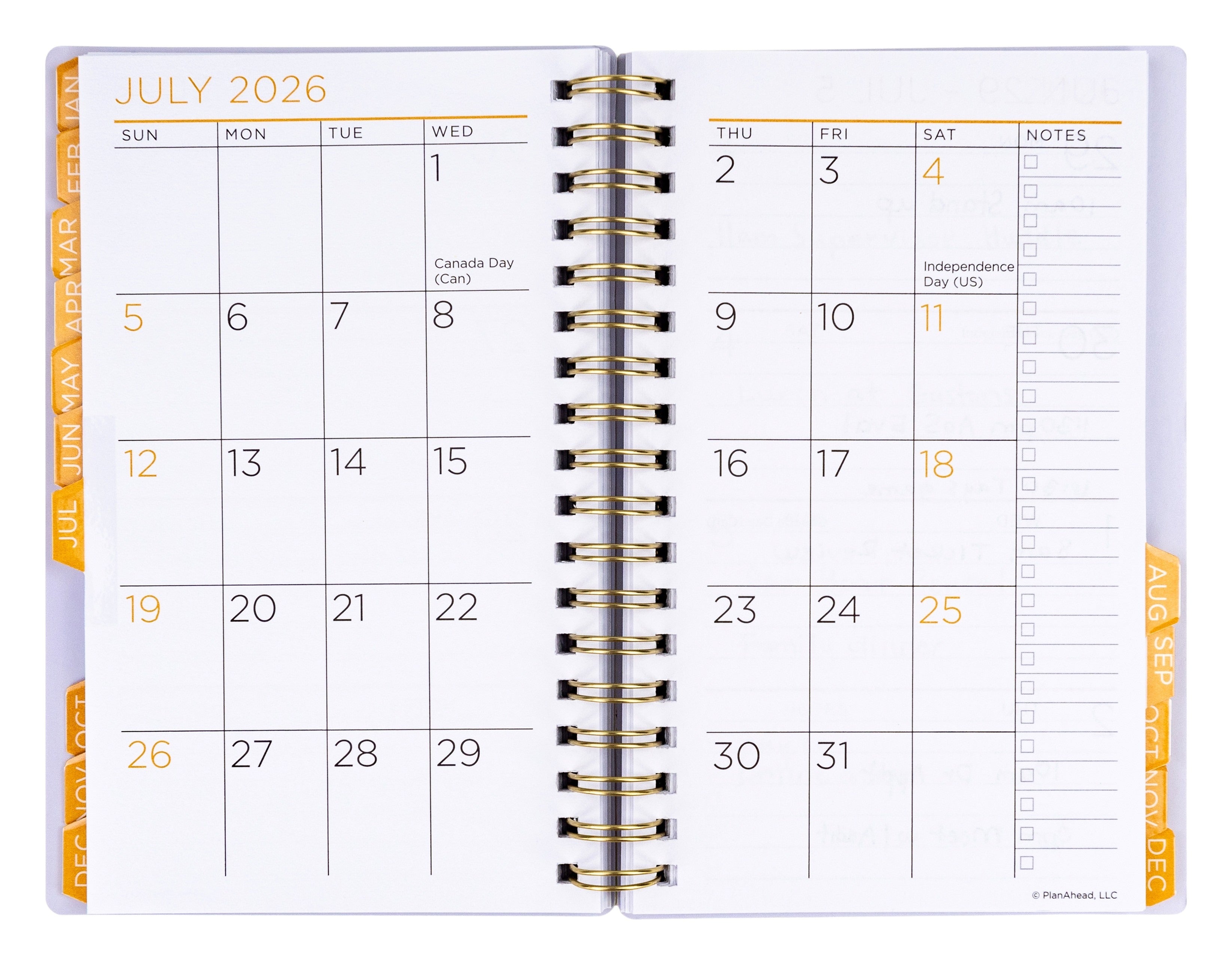 Open planner showing July 2026 calendar with holidays marked.
