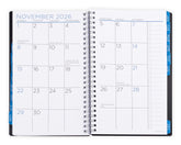 Open spiral-bound planner showing November 2026 with monthly layout.