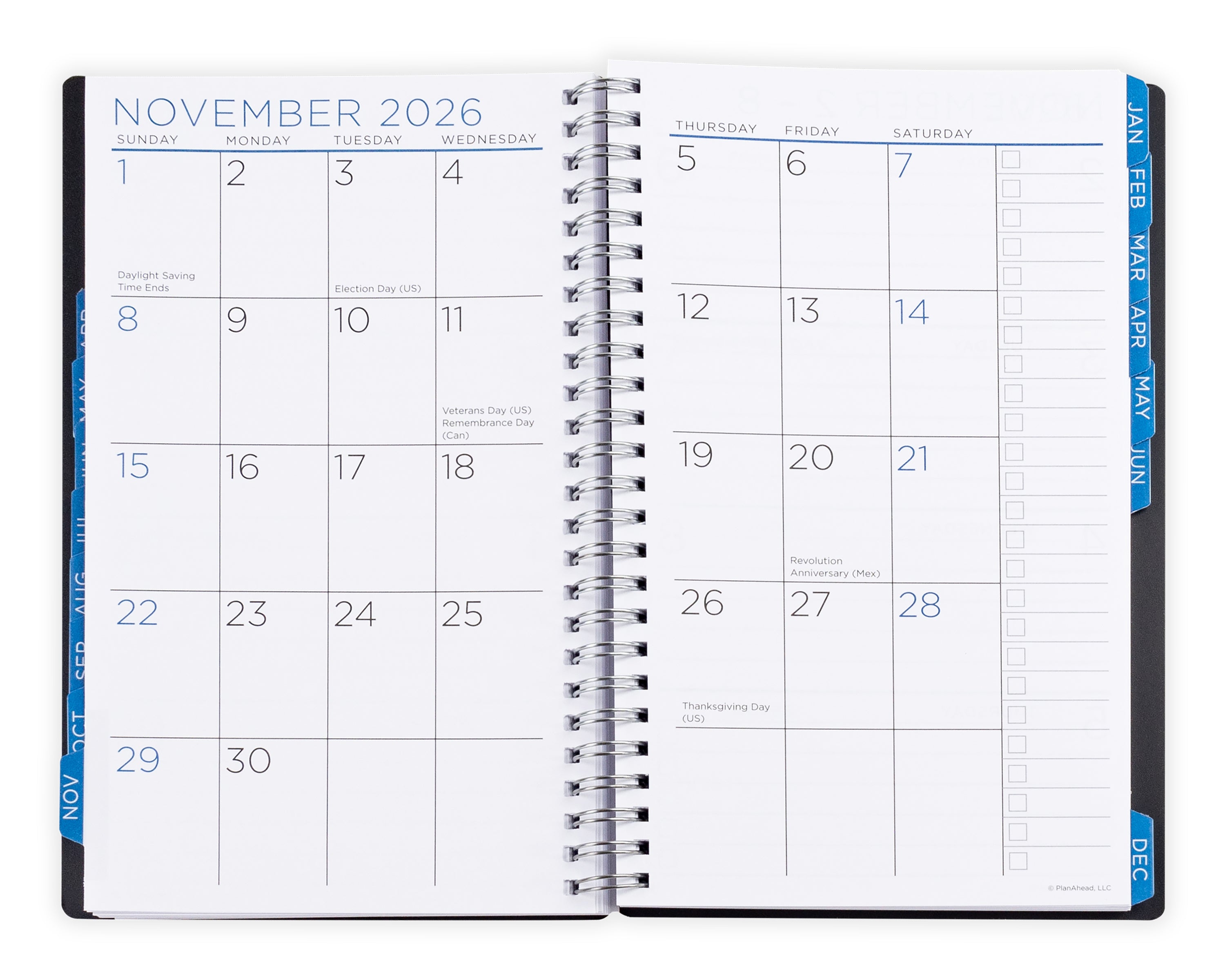 Open spiral-bound planner showing November 2026 with monthly layout.