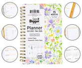 Planner with floral design and various pages displayed on a white background
