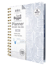 white daily planner with white cover displaying &